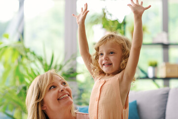 Wall Mural - Mother and child together at home