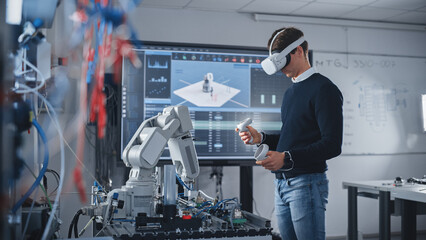 Poster - Student Engineer Wearing Virtual Reality Headset Holding Controllers and Moving Bionic Claw Under his Control During the Lesson. University with Modern Equipment. Computer Science Education Concept.