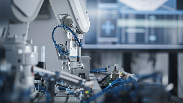 robotics industry four engineering facility robot arm moving at different directions. high tech indu