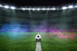 Fototapeta Sport - textured soccer game field with neon fog - center, midfield