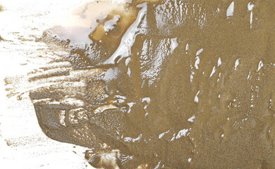 Wall Mural - Wet sand isolated on white background, top view