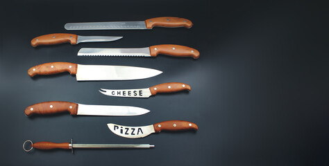 Wall Mural - Close-up of top view of Set of knives of kitchen metal displayed