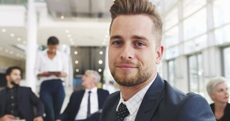 Aufkleber - Handsome, young business man smiling and laughing in a meeting during a professional conference, seminar or convention. Planning for success, talking and discussing strategy with his work team