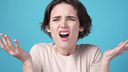 Poster - Lady astonished scared fake novelty isolated on blue color background