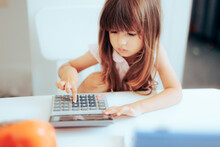 Little Girl Having A Play Pretend Office And As An Accountant. Smart Toddler Child Learning About Finances And Math
