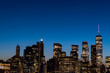© murattellioglu - long exposure view of Manhattan skyscrapers at sunset