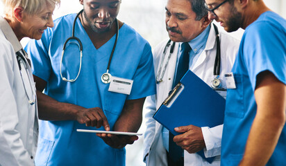 Aufkleber - Group of doctors, medical professionals and workers doing reaching on a tablet, browsing on the internet and discussing a health case together at a hospital. Experts talking about a diagnosis
