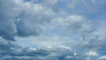 Wall Mural - blue sky white clouds. puffy fluffy white clouds. cumulus cloud cloudscape timelapse. summer blue sk