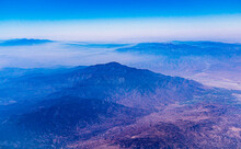 Aerial View Of Mt San Jacinto With Mt San Gorgonio And Mt Baldy In Background