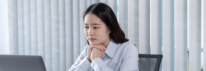 Wall Mural - Businesswoman using laptop for financial and accounting work, Using computers to conduct financial transactions because the convenience, Freelancers work, Online communication, Internet, Wireless.