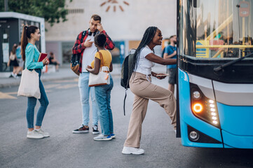 Poster - African american woman entering the bus