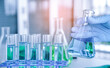 © kelvn - Hand of scientist with test tube and flask in medical chemistry lab, Laboratory research