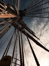 View From Inside A Ship Of The Ship's Main Mast With The Sky In The Background