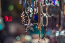 Close-up Of A Silver Starfish Pendant In A Craft And Handmade Store