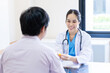 © NewSaetiew - The doctor talks about recovering and consulting the patient at the hospital.