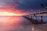 Fototapeta  - pier at sunset in Mechelinki