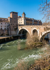 Wall Mural - Tiber Island and Fabricio's Bridge as seen from the riverside, Rome, Italy.