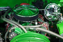 Muscle Car Engine In Close Up. Automobile Accessories Concept. Internal Green Color, Shiny, And Nice Design Of Engine