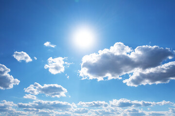 Bright sun in the blue sky. natural background.