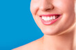 © Тарас Белецкий - Healthy white smile close up. Beauty woman with perfect smile, lips and teeth. Beautiful Model Girl with perfect skin. Teeth whitening. World Smile Day.