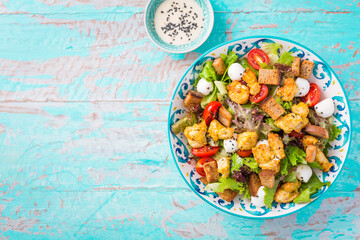 Wall Mural - Healthy Grilled Chicken Caesar Salad with Cheese and Croutons