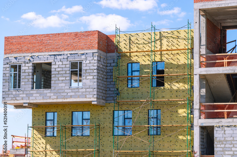 Frame of a building under construction. Construction of buildings in ...