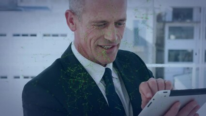 Poster - Network of connections over caucasian senior businessman using digital tablet at office