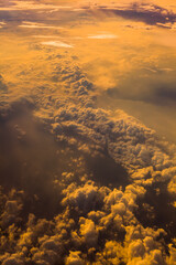 Wall Mural - sunset clouds background and texture, clouds from airplane window