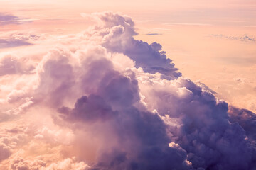 Wall Mural - sunset clouds background and texture, clouds from airplane window