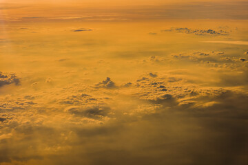 Wall Mural - sunset clouds background and texture, clouds from airplane window