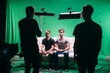 © Anna - Professional male actors work in the frame on the set. Shooting with actors on a big green chroma key.