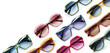 © amedeoemaja - Sunglasses composition in many bright colors in transparent plastic. Top view with shadow. Trendy glasses isolated on white background. Glasses with polarized lenses. Fashionable eyewear for women.