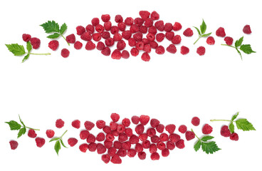 Wall Mural - Red ripe raspberries and green leaves on a white background. View from above