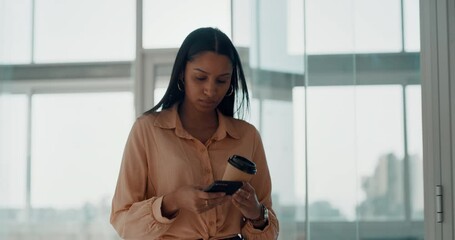 Poster - Focused, serious and powerful business woman using a phone and walking in the corridor or office building. Young corporate female leaving her workplace while texting and having her morning coffee