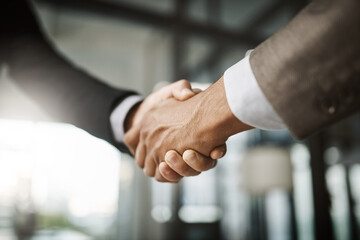 Leinwandbilder - A professional handshake after an interview meeting for a successful company in a modern corporate office. Formal executive businessman shaking customers hand after a contract deal agreement together