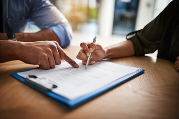 lawyer, broker or hr manager signing a contract agreement with client or employee. financial advisor