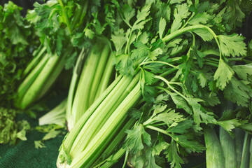 Wall Mural - A view of several stalks of celery, on display at a local farmers market.