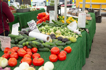 Sticker - A view of a table full of fresh farmers market produce.