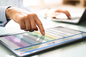 Poster - Man Using Spreadsheet Data