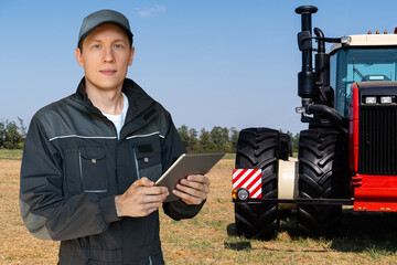 Aufkleber - Farmer with a digital tablet on the background of an agricultural tractor