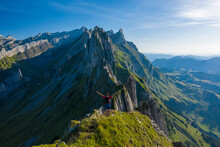 Aerial View Of A Person On A Mountain Peak On Swiss Alps, Sax, St. Gallen, Switzerland.