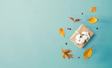 Wall Mural - Gift box with autumn theme - overhead view flat lay