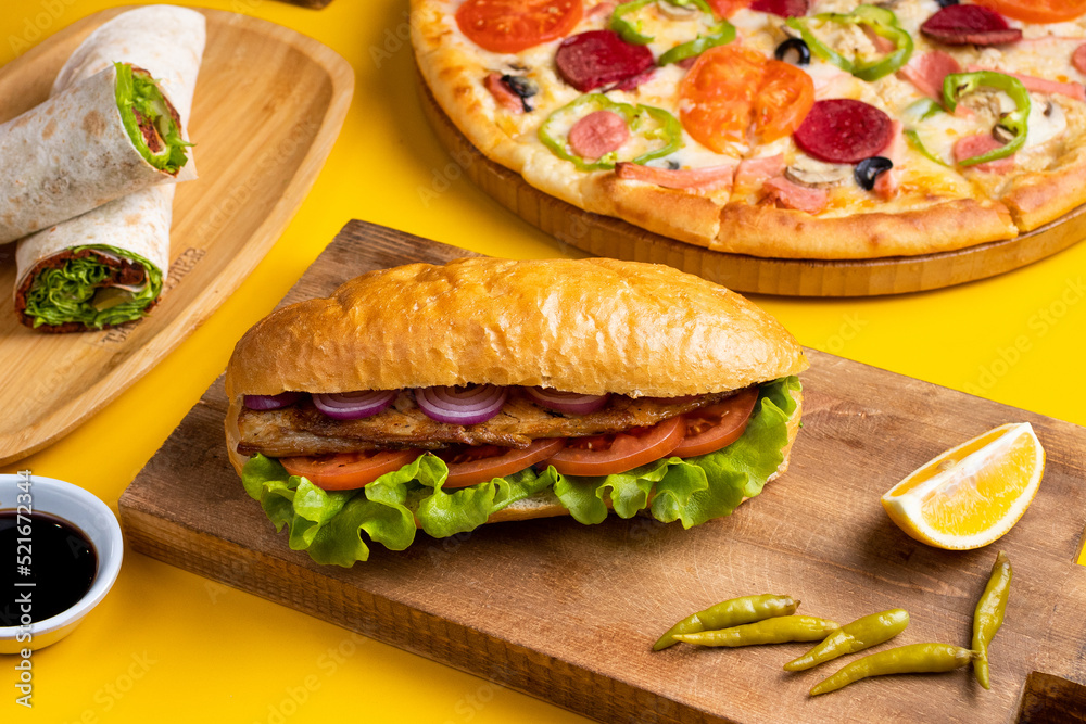 Doner Fish Fish doner kebab, pizza and durum kebab top view Stock Photo | Adobe Stock