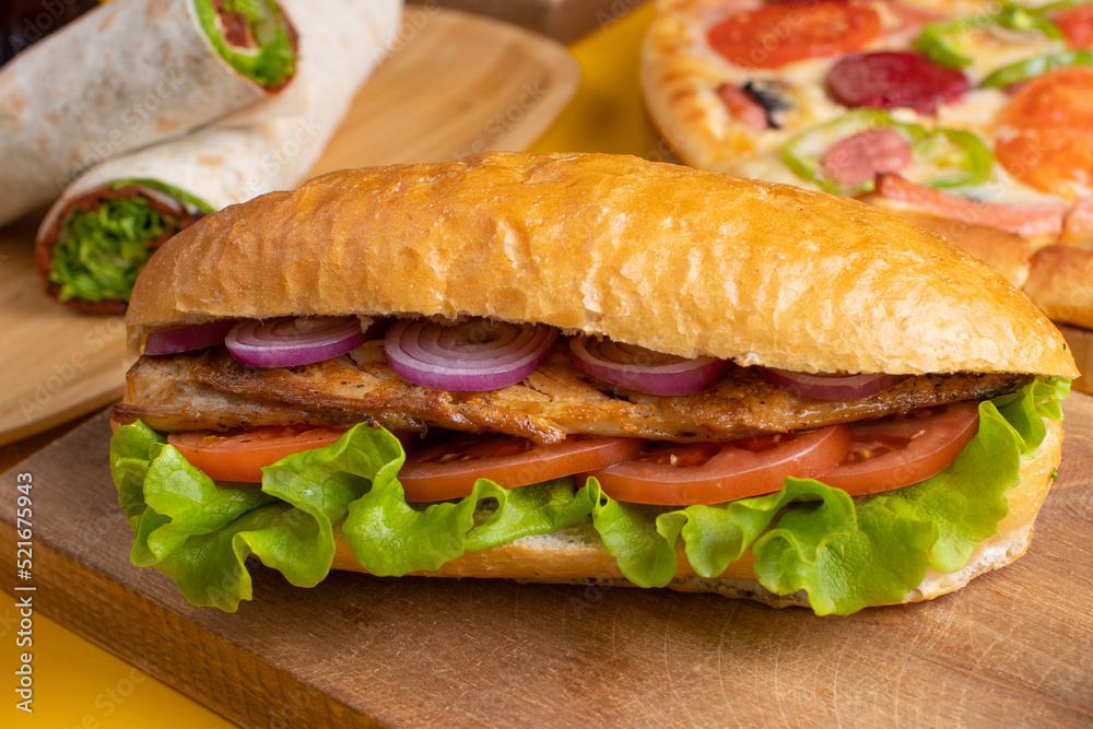 Doner Fish Fish doner kebab, pizza and durum kebab top view Stock Photo | Adobe Stock
