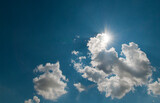 Fototapeta Fototapeta z niebem - Słońce w chmurach