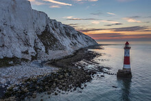 Epic Vibrant Summer Dawn Landscape Image Of Beachy Head Lighthouse In South Downs National Park In England