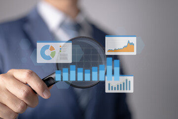 Businesspeople using a dashboard graph and statistical analysis to understand corporate finance and investment ideas.