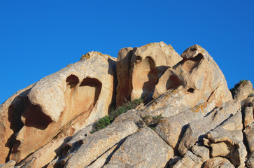 Wall Mural - Characteristic rock formations at Capo Comino, Sardinia, Italy