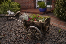 Decorative Wheelbarrow With Flowers Inside