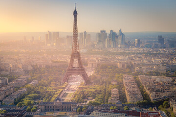 Wall Mural - Eiffel tower and La Defense at dramatic sunrise Paris, France